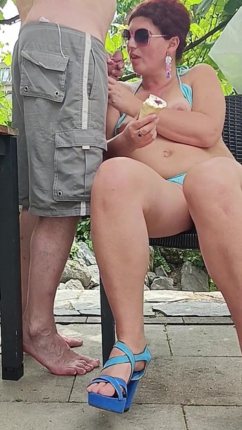 A Beautiful Azerbaijani Woman in a Bikini Licked Ice Cream and Got Cum on Her Face.
