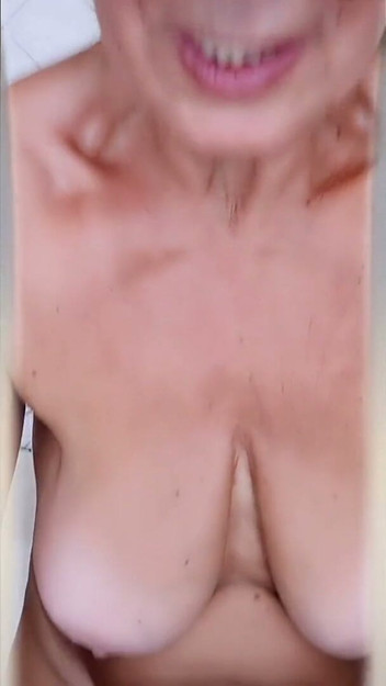 Naked Body of a Hot Older Woman in the Kitchen